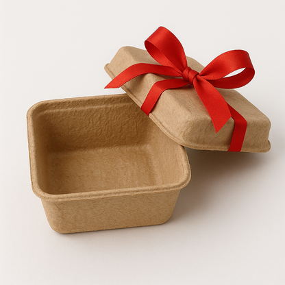 An open corrugated pulp gift box next to its lid, highlighting its reusable and simple two-piece design